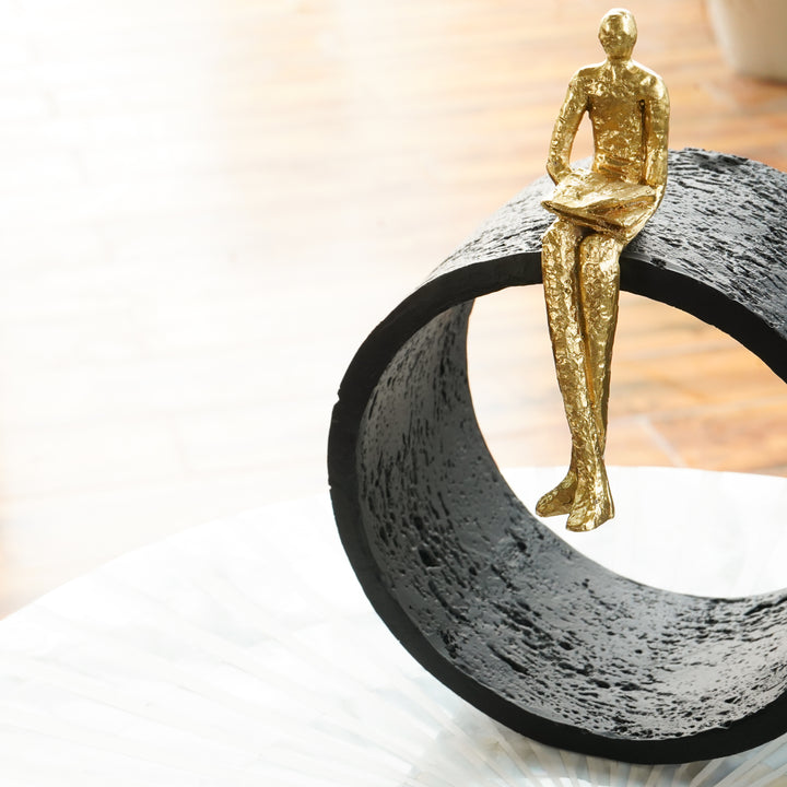 Black & Gold Circular Focused Sitting Figure Sculpture