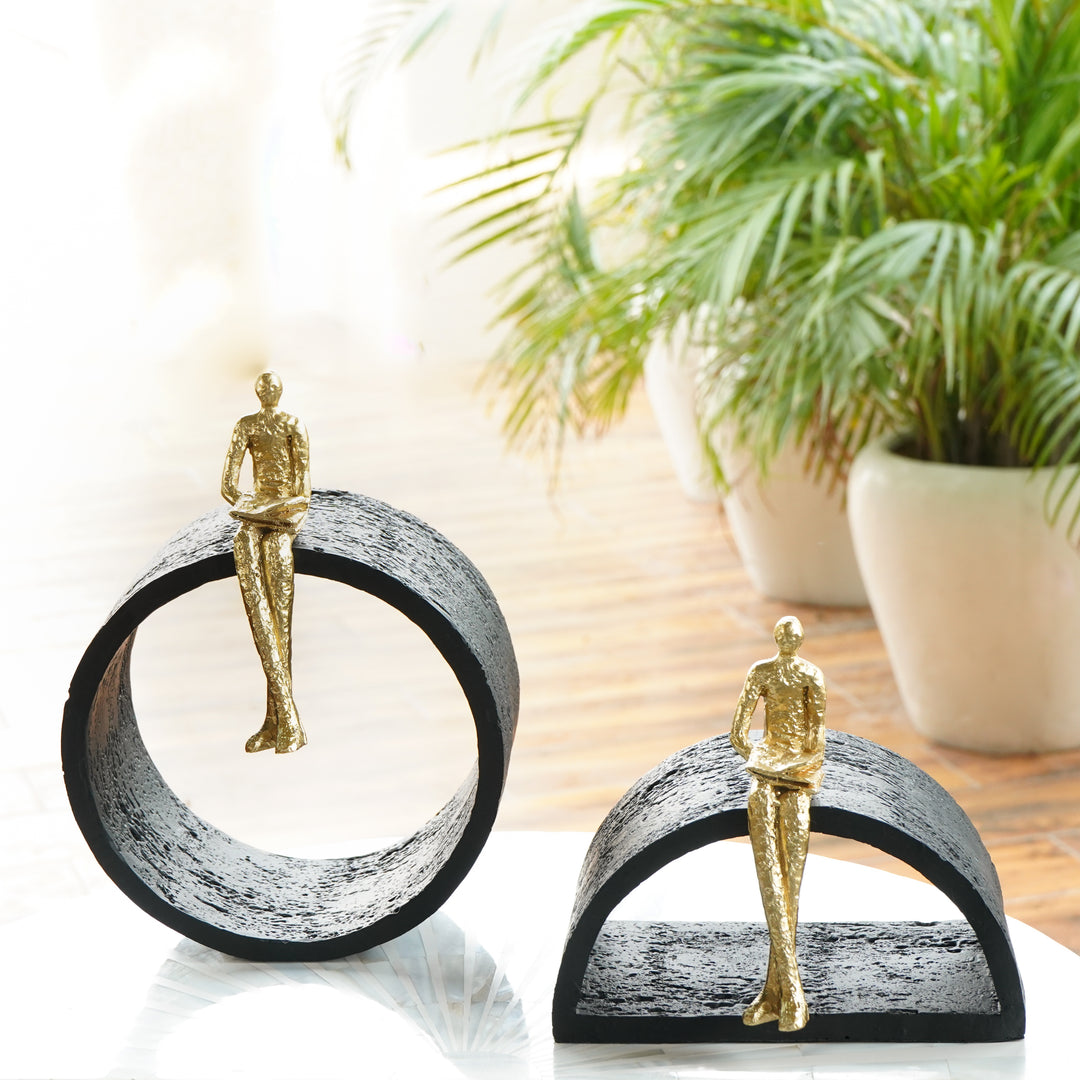 Black & Gold Circular Focused Sitting Figure Sculpture